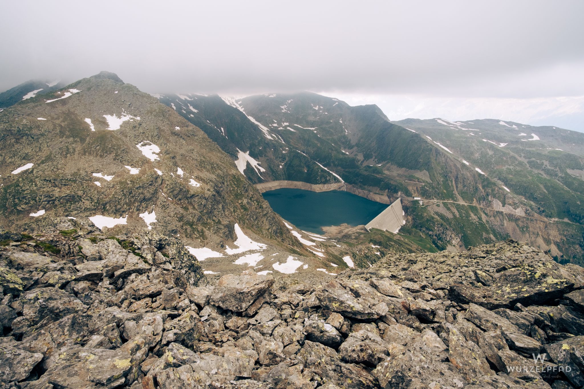 Mutegg-Gipfel, Blick zum Arzker-Stausee